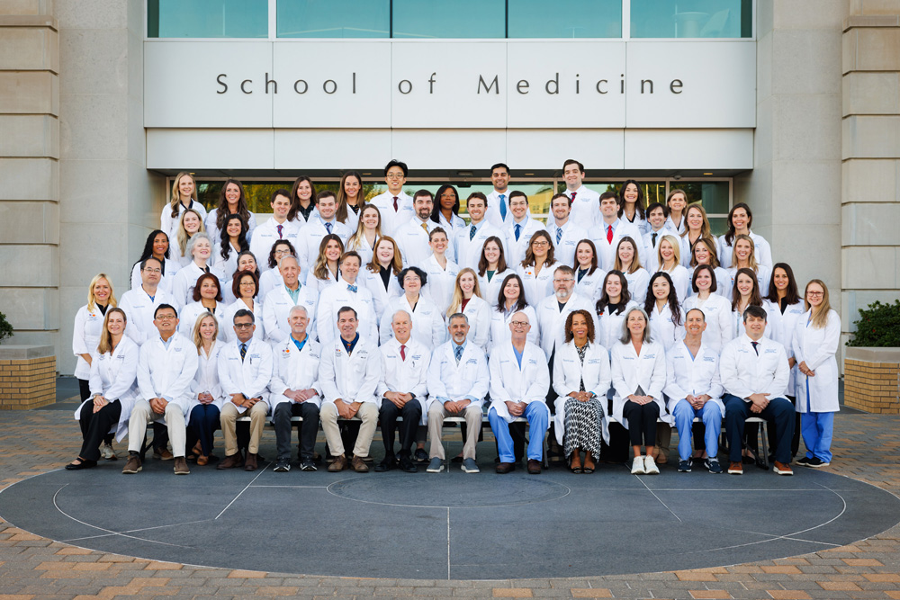 Otolaryngology 2025 faculty group photo in front of the School of Medicine,